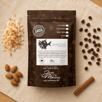 Thumbnail for Overhead flatlay of Jawesome coffee bag with toasted coconut flakes, whole almonds, and a cinnamon stick