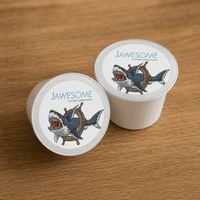 Thumbnail for jawesome flavored coffee single serve pods on wooden surface
