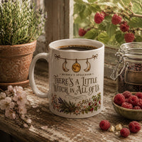 Thumbnail for There's a Little Witch in All of Us Mug filled with coffee, surrounded by herbs and raspberries on a rustic table.