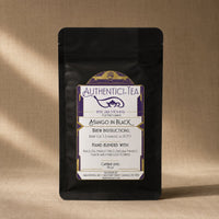 Thumbnail for Mango in Black tea package with a purple label on a brown background