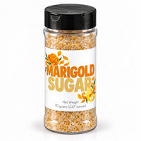 Thumbnail for Marigold Sugar Sprinkle packaged in a clear jar with flowers and citrus designs, showcasing vibrant sugar mix.