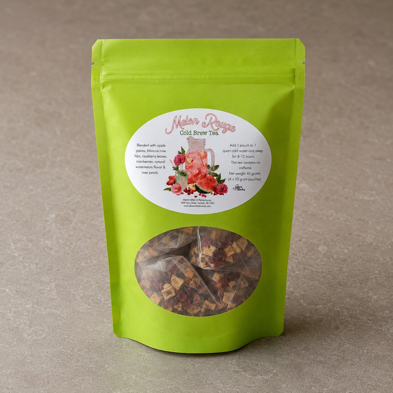 Melon Rouge Green tea package with a label on a brown background