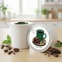 Thumbnail for Minty Thins single-serve coffee pods with coffee beans, dark chocolate, and mint leaves