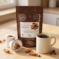 Thumbnail for Momma's Original coffee package with a cup of coffee and coffee pods on a wooden surface.