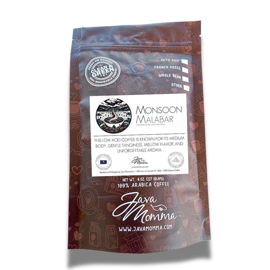 A brown, resealable bag of Indian Monsoon Malabar Coffee—dark roast, low acid, single origin 100% Arabica whole beans. Features a white label with brewing icons and coffee graphics. Learn more at www.javamomma.com.