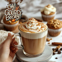Thumbnail for Java Momma Oh My Gourd Becky latte topped with whipped cream and cinnamon, styled with pumpkin muffins and spiced nuts – pumpkin muffin with cream cheese latte vibes