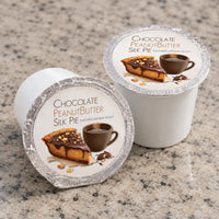 Thumbnail for Two single-serve coffee pods for Chocolate Peanut Butter Silk Pie, displayed on a speckled granite countertop.