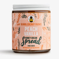 Thumbnail for A jar of Peach Vanilla Honey Cream Spread 🍑 – Sweet Summer Bliss in a Jar, with a white lid and peach-colored, floral- and animal-illustrated label. This natural spread comes in an 8 oz (226g) jar—refrigerate after opening.