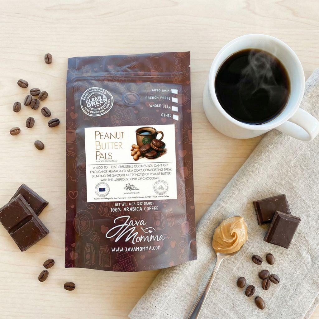 Peanut Butter Pals coffee bag with mug of black coffee, peanut butter spoon, and chocolate pieces