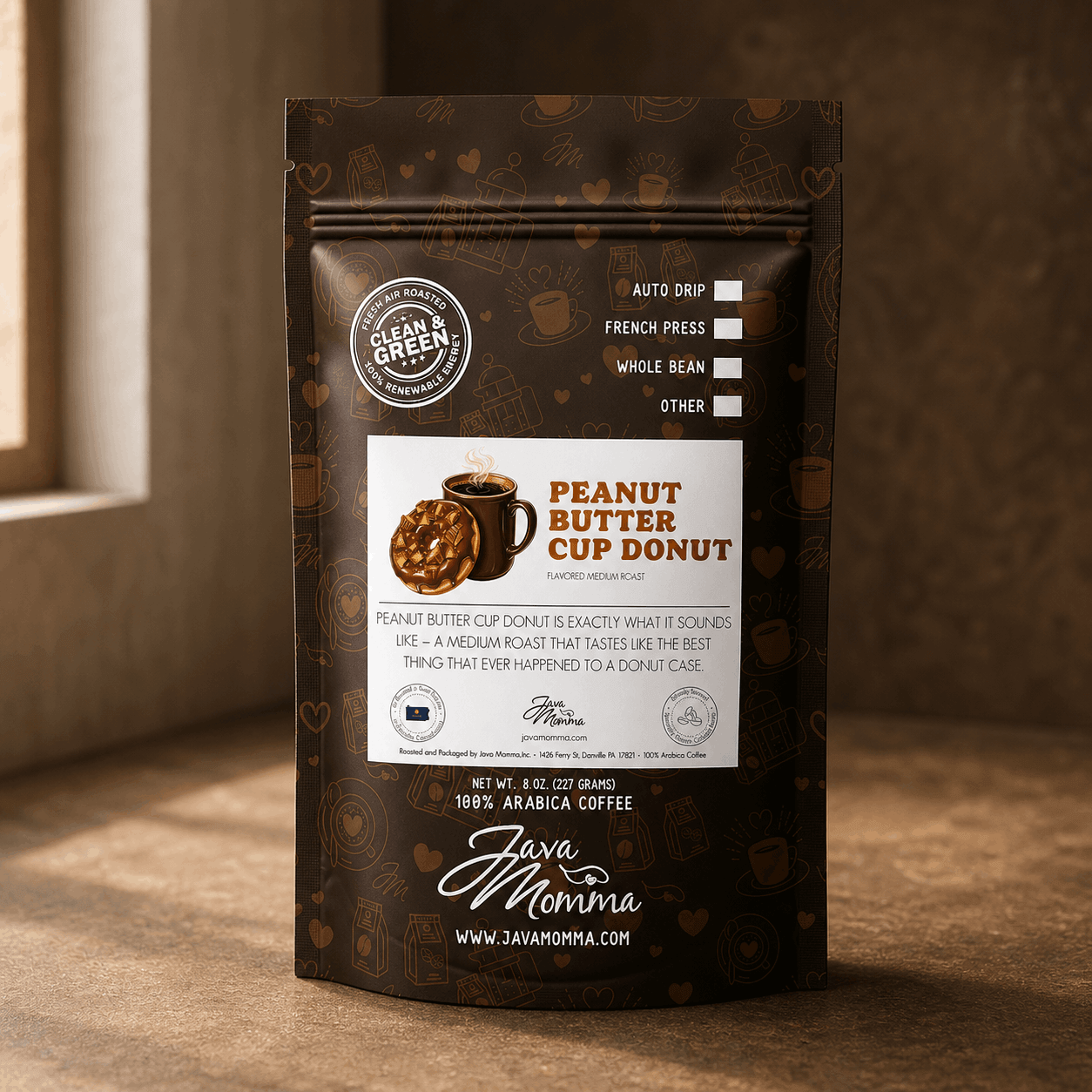Java Momma Peanut Butter Cup Donut flavored coffee bag on a warm wood surface
