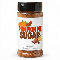Thumbnail for A clear plastic jar of Pumpkin Pie Sugar spice blend with a black lid and a white label featuring pumpkin, cinnamon, and ginger illustrations. The label reads 'PUMPKIN PIE SUGAR' in orange and brown text, with 'Net Weight 78 grams (2.