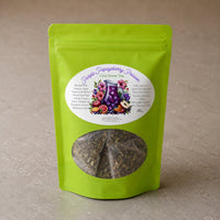 Thumbnail for Purple Papayaberry in green tea package with a label on a beige background