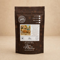 Thumbnail for Java Momma Spiced Cookie cream coffee packaging with a label on a beige background
