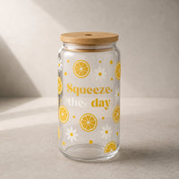 Thumbnail for Glass jar with wooden lid featuring lemon and flower design on a neutral background