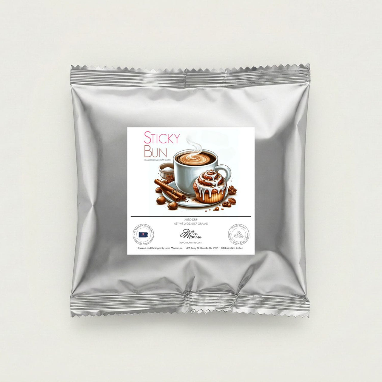 Silver package of 'Sticky Bun' with a coffee cup and bun illustration on a white background