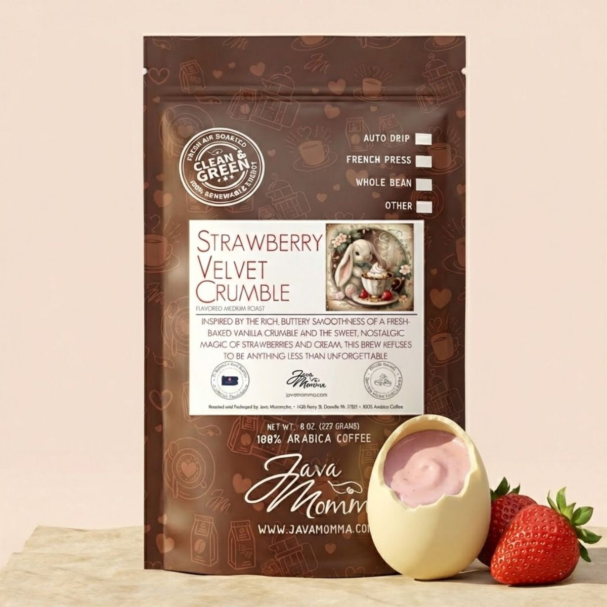 Coffee package labeled 'Strawberry Velvet Crumble' with a strawberry and cream dessert on a beige background