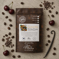 Thumbnail for Java Momma Sumatra Extra Dark coffee package with cherries, chocolate, and vanilla on a textured surface