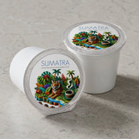 Thumbnail for Two Sumatra coffee pods with colorful designs on a light gray background
