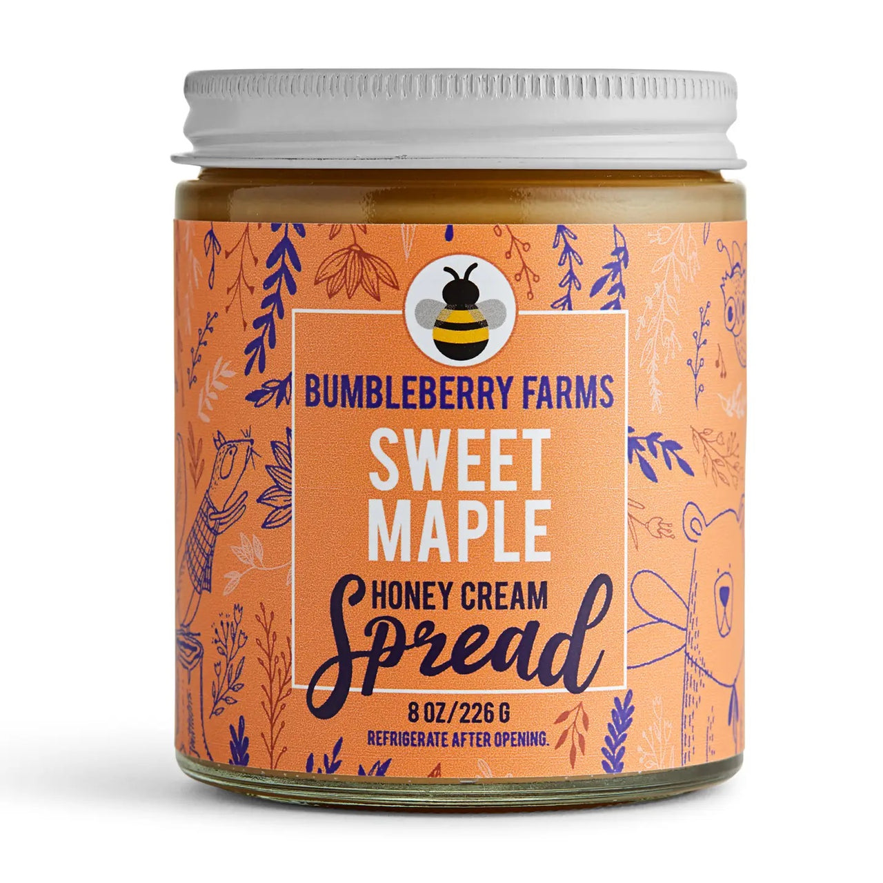 An 8 oz (226 g) jar of Sweet Maple 🍁 Honey Cream Spread—Cozy Maple Bliss in Every Bite—with an illustrated orange label featuring leaves, a bee logo, and animals. Made with wildflower honey and maple syrup. Refrigerate after opening.