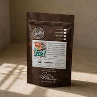 Thumbnail for Bag of Java Momma Talk to Me After This coffee on a warm wood surface