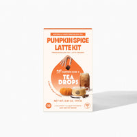 Thumbnail for Front of the Pumpkin Spice Latte Kit – Fall’s Coziest Tea Latte Gift Set 🎃☕🍁 box, featuring Pumpkin Spice Tea Drops, pumpkin and latte images, and hands pouring creamer. Text highlights naturally sweetened black tea—perfect Fall gift.